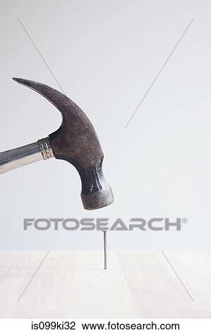 Hammer and nail View Large Photo Image Stock Image - Hammer and nail. Fotosearch