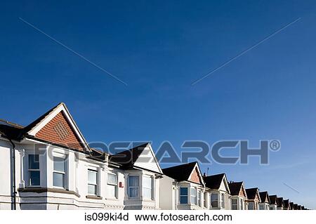 Houses and blue sky View Large Photo Image Stock Image - Houses and blue sky. Fotosearch