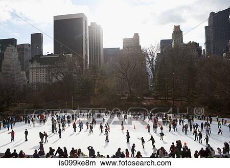 Ice skating in Central Park, New York City, USA View Large Photo Image Picture - Ice skating in Central Park, New York City, USA. Fotosearch