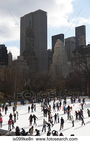 Ice skating in Central Park, New York City, USA View Large Photo Image Picture - Ice skating in Central Park, New York City, USA. Fotosearch