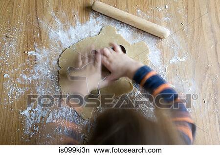 Little boy making gingerbread men View Large Photo Image Picture - Little boy making gingerbread men. Fotosearch