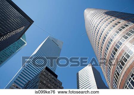 Low angle view of Manhattan skyscrapers, New York City, USA View Large Photo Image Stock Photograph - Low angle view of Manhattan skyscrapers, New York City, USA. Fotosearch