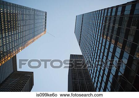 Low angle view of skyscrapers View Large Photo Image Picture - Low angle view of skyscrapers. Fotosearch