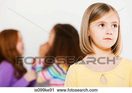 One girl excluded from other girls View Large Photo Image Stock Image - One girl excluded from other girls. Fotosearch