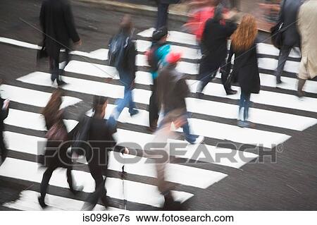 Stock Photograph - Pedestrians crossing road. Fotosearch