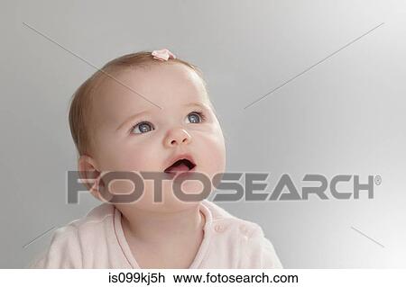Stock Image - Portrait of a baby girl. Fotosearch