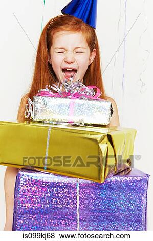 Screaming girl with stack of birthday gifts View Large Photo Image Stock Photo - Screaming girl with stack of birthday gifts. Fotosearch
