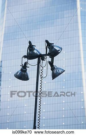Street light and skyscraper View Large Photo Image Stock Image - Street light and skyscraper. Fotosearch