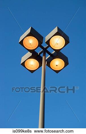 Street lights and blue sky View Large Photo Image Stock Photograph - Street lights and blue sky. Fotosearch