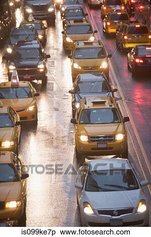 Stock Photography - Taxicabs in New York City traffic, USA. Fotosearch