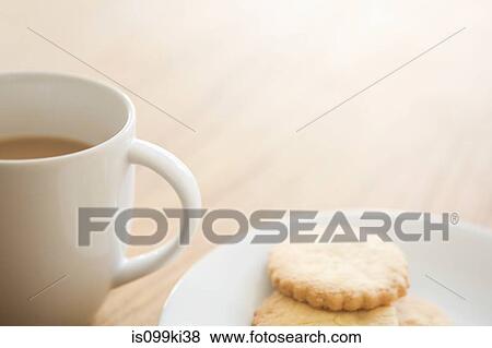 Tea and biscuits View Large Photo Image Stock Photo - Tea and biscuits. Fotosearch