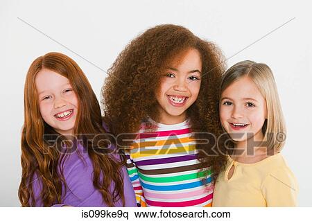 Three girls smiling View Large Photo Image Stock Photography - Three girls smiling. Fotosearch
