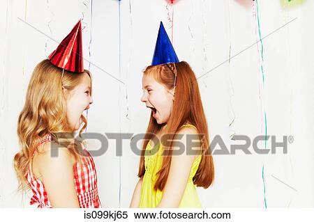 Stock Photography - Two girls screaming at each other. Fotosearch