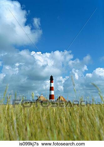 Stock Photograph - Westerhever lighthouse, coast of North Sea, Schleswig-Holstein, Germany. Fotosearch
