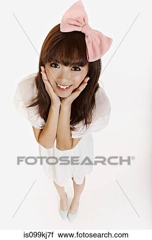 Young woman wearing a bow on her hair View Large Photo Image Stock Image - Young woman wearing a bow on her hair. Fotosearch
