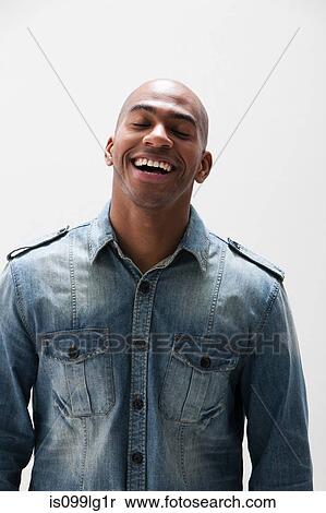 African American man smiling, studio shot View Large Photo Image Stock Photography - African American man smiling, studio shot. Fotosearch