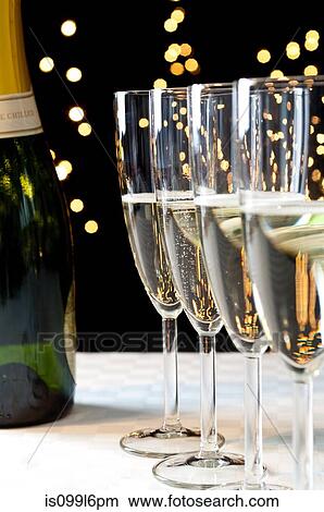 Bottle and glasses of champagne View Large Photo Image Picture - Bottle and glasses of champagne. Fotosearch