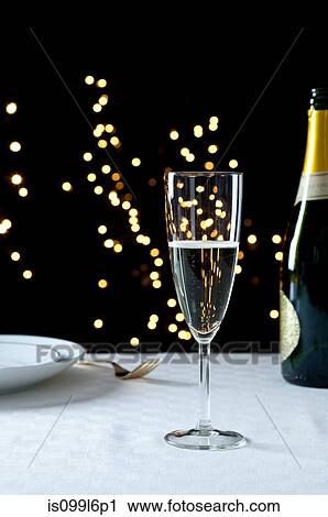 Champagne on a table View Large Photo Image Stock Image - Champagne on a table. Fotosearch