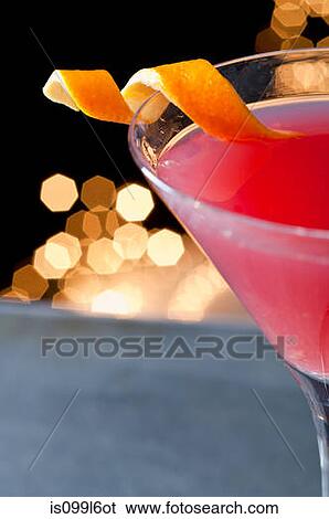Cosmopolitan cocktail with twist of orange peel View Large Photo Image Stock Photograph - Cosmopolitan cocktail with twist of orange peel. Fotosearch