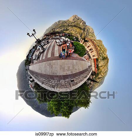 Stock Photography - Family on vacation in Kotor, Monte, little planet effect. Fotosearch
