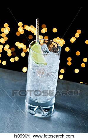 Gin and tonic in glass View Large Photo Image Stock Image - Gin and tonic in glass. Fotosearch