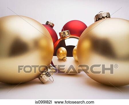 Gold Christmas decorations, studio shot View Large Photo Image Stock Image - Gold Christmas decorations, studio shot. Fotosearch