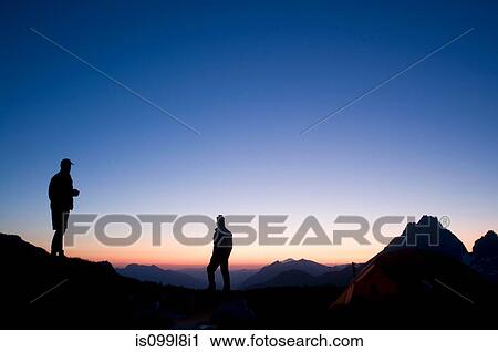 Male backpackers at camp in evening, Kool Aid Lake, Ptarmigan Traverse, North Cascades, Washington, USA View Large Photo Image Stock Image - Male backpackers at camp in evening, Kool Aid Lake, Ptarmigan Traverse, North Cascades, Washington, USA. Fotosearch