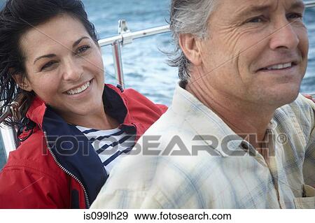 Mature couple sailing, close up View Large Photo Image Stock Photo - Mature couple sailing, close up. Fotosearch