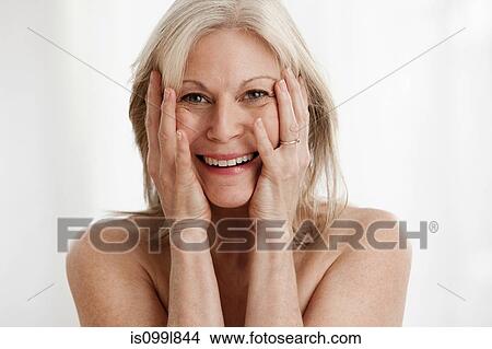 Picture - Mature woman laughing, portrait. Fotosearch