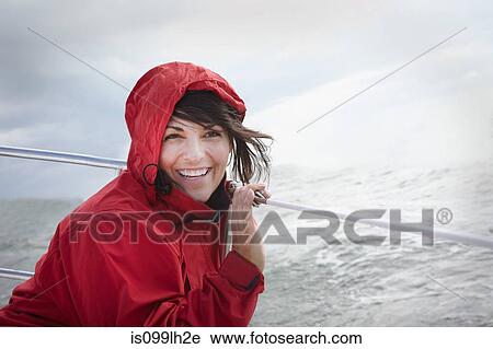 Mature woman sailing View Large Photo Image Stock Image - Mature woman sailing. Fotosearch