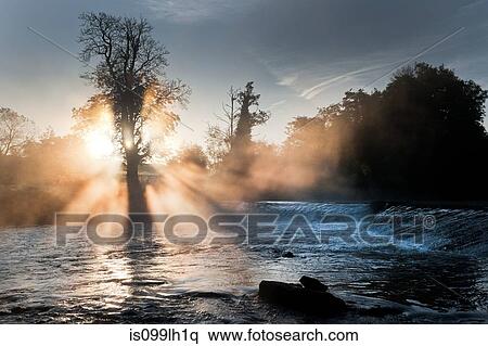 Stock Photography - Mulkear river in fog, limerick, ireland. Fotosearch
