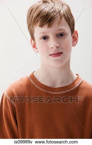 Portrait of boy in brown sweater, studio shot View Large Photo Image Stock Photo - Portrait of boy in brown sweater, studio shot. Fotosearch