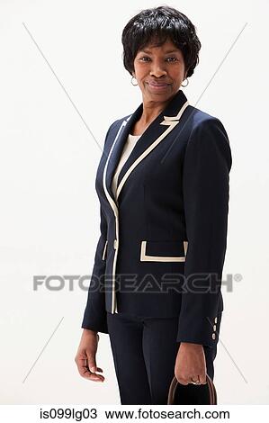 Portrait of mature African American businesswoman, studio shot View Large Photo Image Stock Image - Portrait of mature African American businesswoman, studio shot. Fotosearch