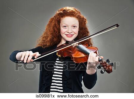 Portrait of mixed race teenage girl playing violin View Large Photo Image Stock Photo - Portrait of mixed race teenage girl playing violin. Fotosearch