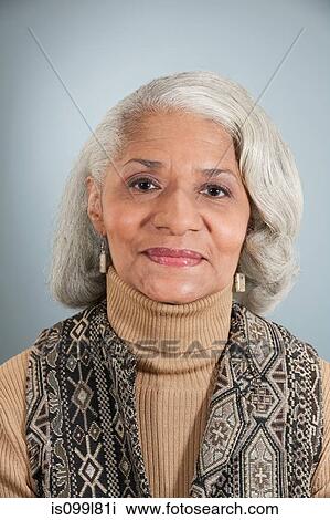 Portrait of senior woman in studio View Large Photo Image Stock Image - Portrait of senior woman in studio. Fotosearch