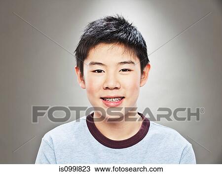 Portrait of young Asian teenage boy View Large Photo Image Stock Image - Portrait of young Asian teenage boy. Fotosearch