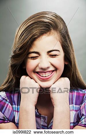 Portrait of young teenage girl laughing with eyes closed View Large Photo Image Stock Image - Portrait of young teenage girl laughing with eyes closed. Fotosearch