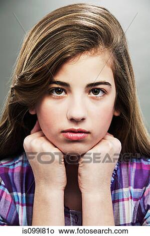 Picture - Portrait of young teenage girl, studio shot. Fotosearch
