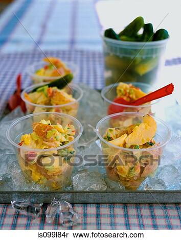 Potato salad in bowls on tray of ice View Large Photo Image Stock Photography - Potato salad in bowls on tray of ice. Fotosearch