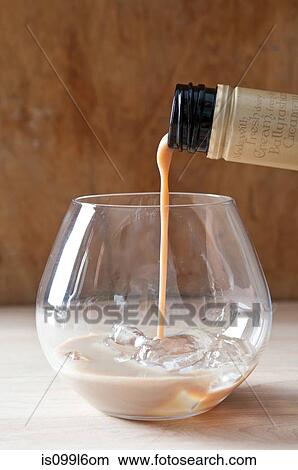 Pouring irish cream View Large Photo Image Picture - Pouring irish cream. Fotosearch