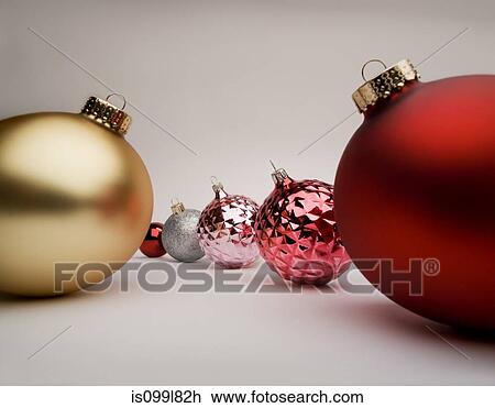 Red and gold Christmas decorations, studio shot View Large Photo Image Stock Image - Red and gold Christmas decorations, studio shot. Fotosearch