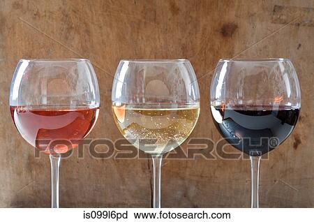 Rose, white and red wines in glasses View Large Photo Image Stock Image - Rose, white and red wines in glasses. Fotosearch