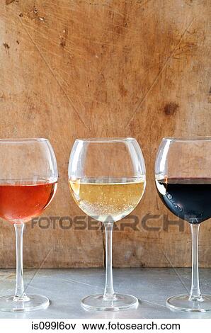 Rose, white and red wines in glasses View Large Photo Image Stock Photo - Rose, white and red wines in glasses. Fotosearch