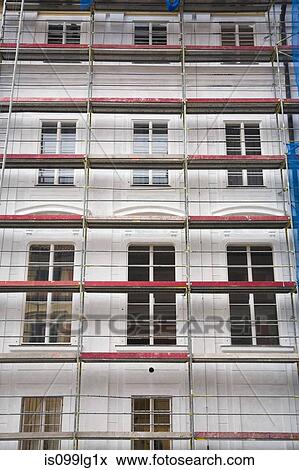 Stock Photo - Scaffolding on building, Castle district, Prague, Czech Republic. Fotosearch