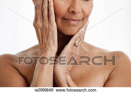 Senior woman against white background View Large Photo Image Stock Photo - Senior woman against white background. Fotosearch