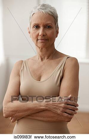 Stock Image - Senior woman smiling, portrait. Fotosearch