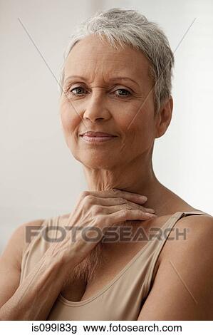 Senior woman smiling, portrait View Large Photo Image Stock Image - Senior woman smiling, portrait. Fotosearch