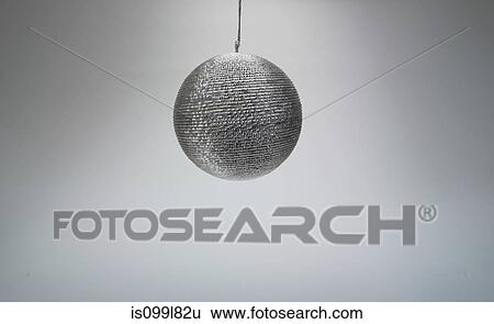Silver Christmas bauble, studio shot View Large Photo Image Stock Photograph - Silver Christmas bauble, studio shot. Fotosearch