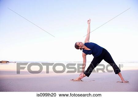 Woman doing yoga on beach, Playa Grande, Santa Cruz, Costa Rica View Large Photo Image Stock Image - Woman doing yoga on beach, Playa Grande, Santa Cruz, Costa Rica. Fotosearch