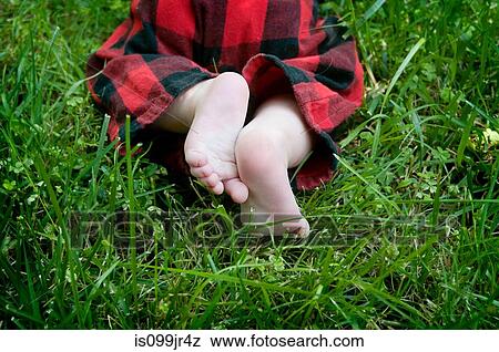 Baby crawling on grass View Large Photo Image Stock Photo - Baby crawling on grass. Fotosearch